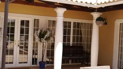 a bathroom with a toilet and a shower at Villa with pool children Very welcome Algarve Portugal for 10 people in Quarteira