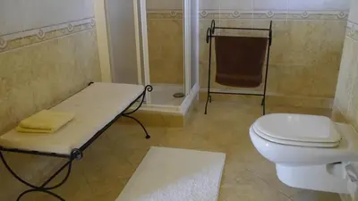 an empty hallway with a large window in a building at Villa with pool children Very welcome Algarve Portugal for 10 people in Quarteira