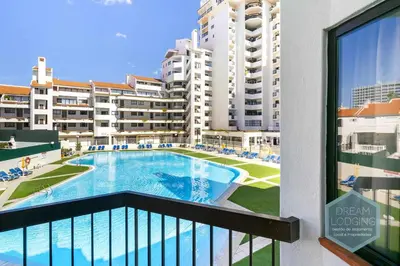 a view of a swimming pool from a balcony of a apartment at Vila Magna 109 - Dream Lodging in Albufeira