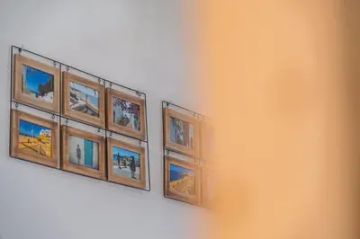 three framed photographs hanging on a wall at Apartment Vento in Albufeira