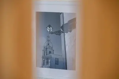 a picture of a church seen through a window at Apartment Vento in Albufeira