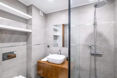 a bathroom with a sink and a shower at Apartment Riu - Close to bars shops and restaurants in Albufeira