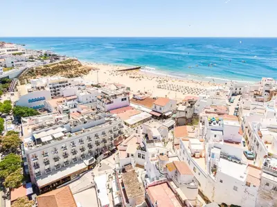 an aerial view of a beach and buildings at Apartment Santana - In the heart of Albufeira in Albufeira