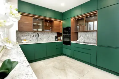 a green kitchen with green cabinets and counters at Green Algarve Gem Spacious 2 BDR By Misha's Place in Faro