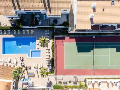 an overhead view of a building with a tennis court at Marina Vista Retreat in Albufeira