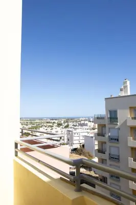 a view from the balcony of a apartment building at Miradouro da Penha in Faro
