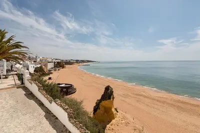 a view of a beach with the ocean at TAC - Sea Apartments 2D in Albufeira