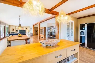a kitchen with a table and a dining room at Villa Palm Retreat - Beautiful idyllic views in Boliqueime