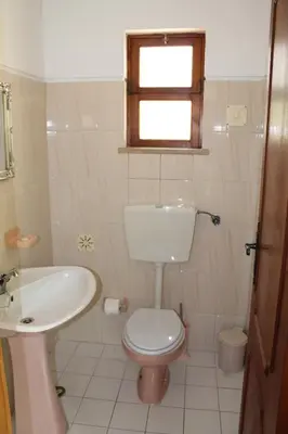a bathroom with a toilet and a sink at ABF18V3 Moradia qualidade e piscina,lindas v in Albufeira