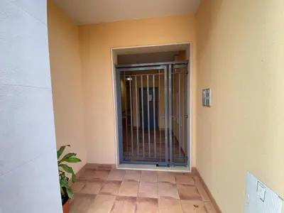 a room with a gate in the corner of a building at Albufeira Sunny Style With Pool by Homing in Albufeira