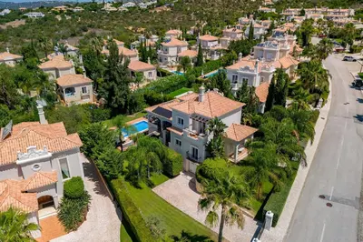 an aerial view of a house with a street at Villa Simone in Almancil