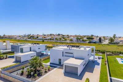 an aerial view of a white building at Villa Casa Magnolia by Villa Plus in Galé