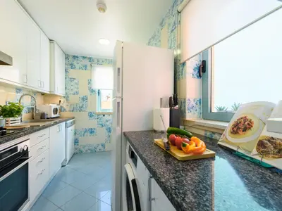 a balcony with a table and a view of a harbor at Apartment The LightHouse by Interhome in Albufeira