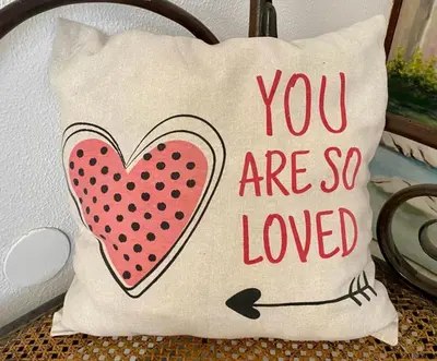 a pillow with a sign that says you are so loved at Blife Aerya private rooms - Airport stay in Faro