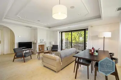 a living room with a couch and a table at Rooftop 27 - Dream Lodging in Albufeira