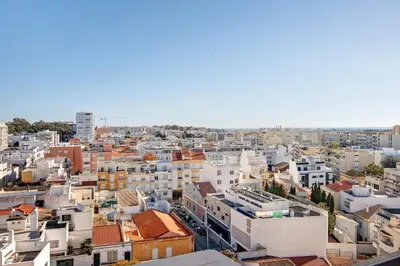 an aerial view of a city with buildings at Casa Alameda in Faro