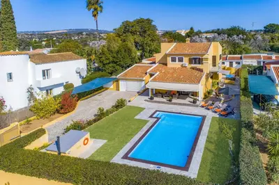 an aerial view of a house with a swimming pool at Villa Tadeu Quatro by Villa Plus in Azinhal