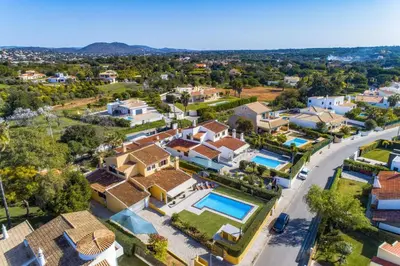 an aerial view of a home with a swimming pool at Villa Tadeu Quatro by Villa Plus in Azinhal