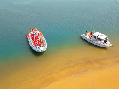 two boats in the water next to each other at Apartment Formentera by Algarve Vacation in Albufeira