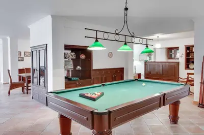 a living room with a pool table in it at Villa Costa Rica in Galé