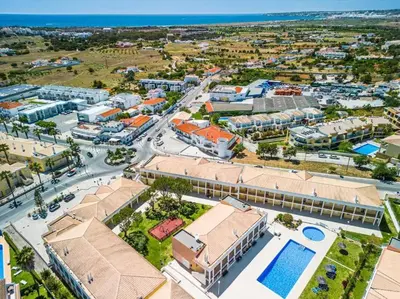 an aerial view of a resort with a pool at Solymar Apartment in Guia