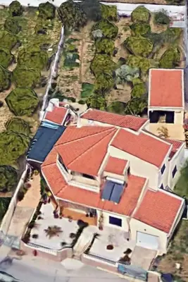 an aerial view of a large house with red roofs at Charming 5 bed Private Villa - Quarteira in Quarteira