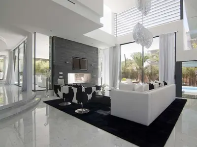 a living room with a white couch and chairs at Phenomenal Algarve Villa Villa Flowerscape 4 Bedrooms Steam Room & Home in Almancil