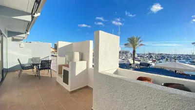 a living room with two couches and a tv at Intemporal Duplex Marina T2 HsR Marina Vilamoura in Vilamoura