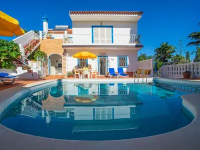 a blue ping pong table on a patio at Villa Fernandes by Interhome in Albufeira