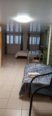 a bathroom with a white toilet and a shower at Apartment near the ocean Rua 5 de Outubro in Albufeira