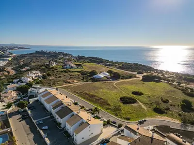 an aerial view of a small island next to the ocean at Apart Ocean View in Albufeira