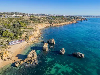 an aerial view of a beach with rocks in the water at Apart Ocean View in Albufeira