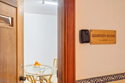 a sign on the door of a guest room at Deluxe Flat by Albufeira Holidays in Albufeira