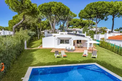 an image of a villa with a swimming pool at Villa Balaia by Villa Plus in Olhos de Água