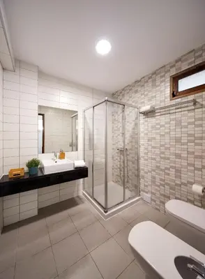 a bathroom with a shower and a sink at Apartments in Albufeira - Old Town in Albufeira