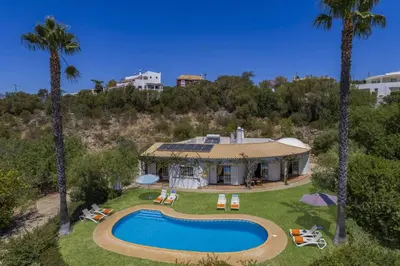 an aerial view of a house with a swimming pool at Villa Casa do Barrocal by Villa Plus in Loulé