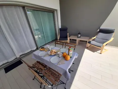 a table with food on it in a room at @Rocking Apartments - Quinta da Alvorada in Albufeira