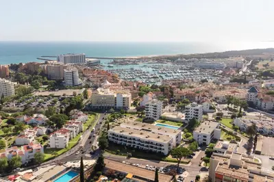 an aerial view of a city with the ocean at MARC - Vilamoura in Vilamoura