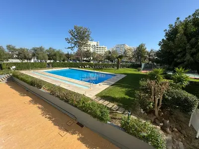 an overhead view of a swimming pool in a park at Newly refurbished 2 bed appt Vilamoura in Vilamoura