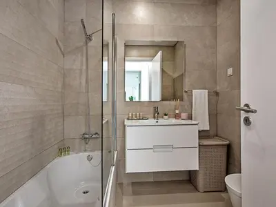a bedroom with a large bed and a window at Villa Sónia Lote 69 - VIP Properties by Interhome in Albufeira