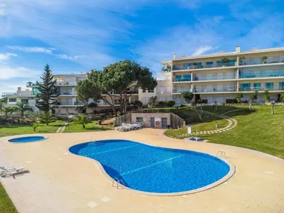 an image of a swimming pool in front of a building at Balaia Residense Penthouse 2 Bedroom Apartment with Pool in Albufeira
