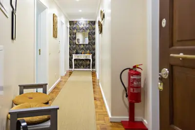 a hallway with a fire hydrant in a room at Blue Peacock in Faro