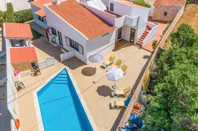 an overhead view of a house with a swimming pool at Villa Mar do Estrela in Galé
