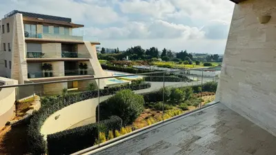 a view from the balcony of a building at Two Bedroom Laguna Village - By Vilamoura Sun in Quarteira