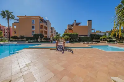 a kitchen with a sink and a counter top at Sunshine Vista Apartment Vilamoura in Vilamoura