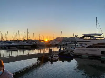 a group of boats docked in a marina at sunset at Villa Algarve Paradise in Vilamoura
