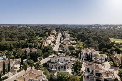 an aerial view of a residential neighborhood with houses at Villa Grace in Almancil