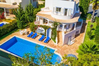 an aerial view of a house with a swimming pool at Villa Katharina in Albufeira