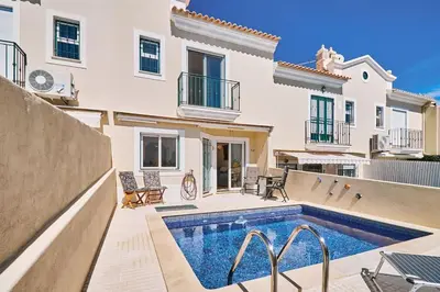 a villa with a swimming pool and a house at Casa Felix mit Pool in Albufeira