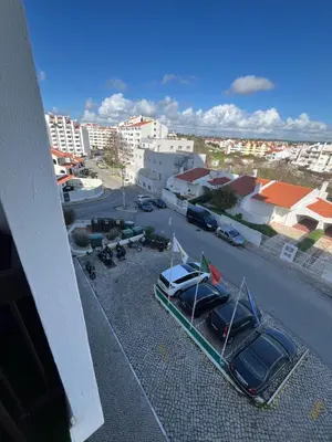 a view of a parking lot with cars in a parking lot at Comfy Home in Albufeira